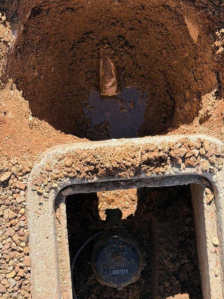 Water leak around the water meter