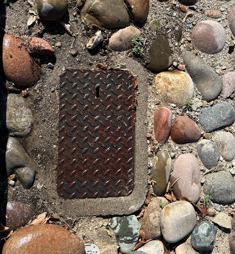 Wet ground around residential water mete